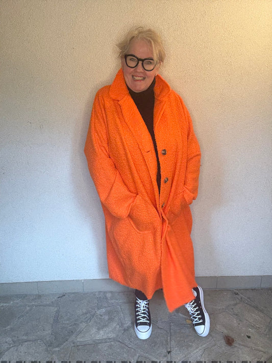 Der Mantel, der Komplimente sammelt