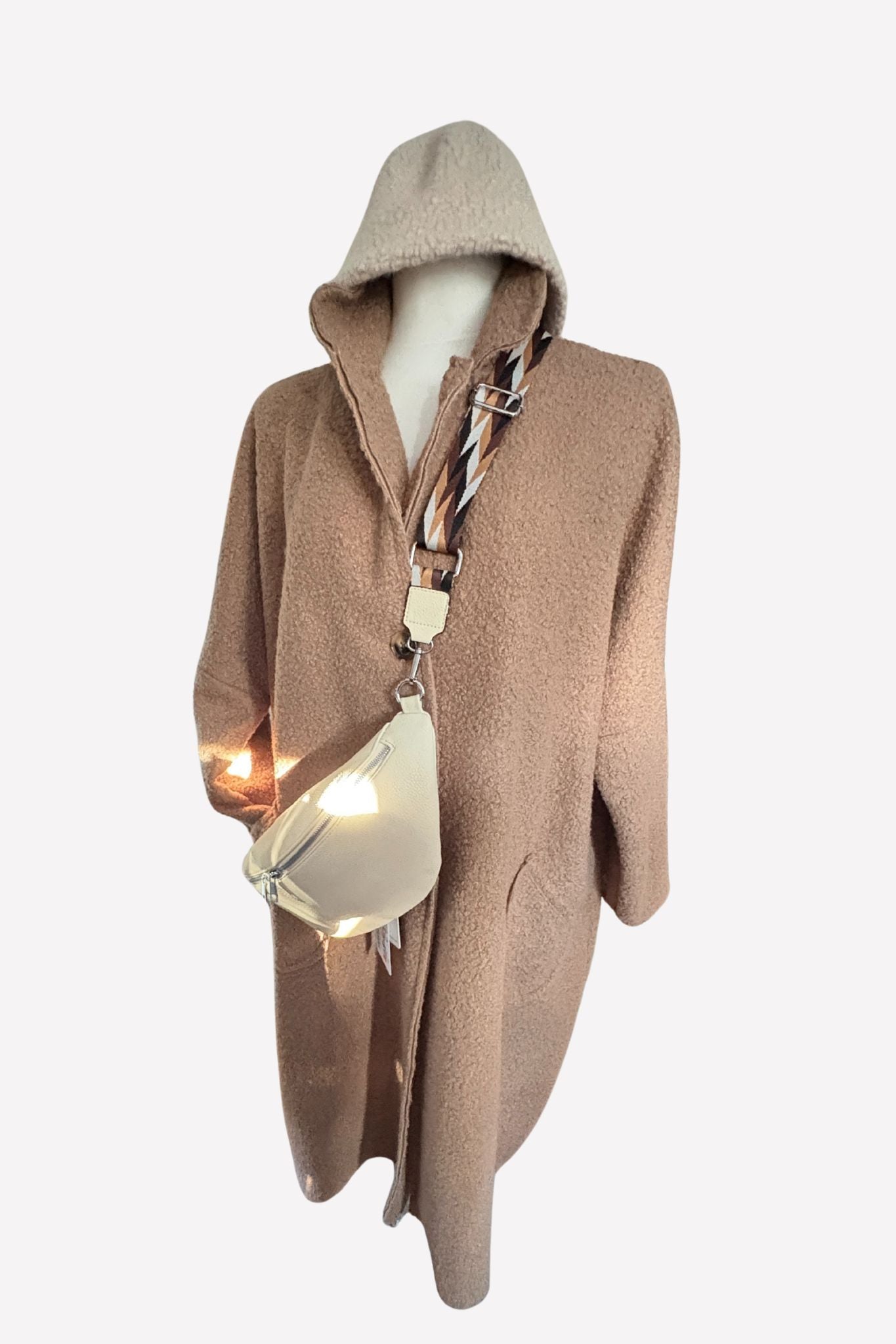 Der Mantel, der Komplimente sammelt