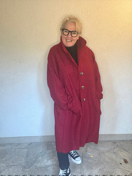 Der Mantel, der Komplimente sammelt